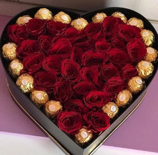 VALENTINES DAY GIFT 
LOVE SHAPE WITH CHOCOLATES AND FLOWERS 
TSH 150,000