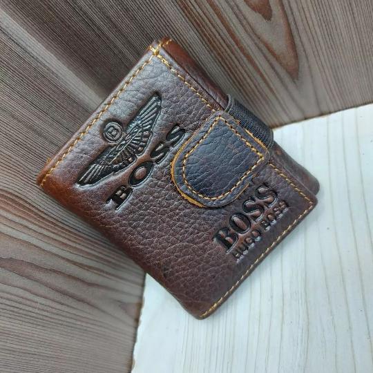 Brand new Original wallets Model:181 going on SALE at 
 ?Porch; Tsh 22,000/=
? wallet;kuanzia Tsh 22,000/= 
 ? belts;  Tsh 29,00