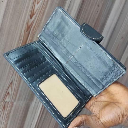 Brand new Original wallets Model:181 going on SALE at 
 ?Porch; Tsh 22,000/=
? wallet;kuanzia Tsh 22,000/= 
 ? belts;  Tsh 29,00