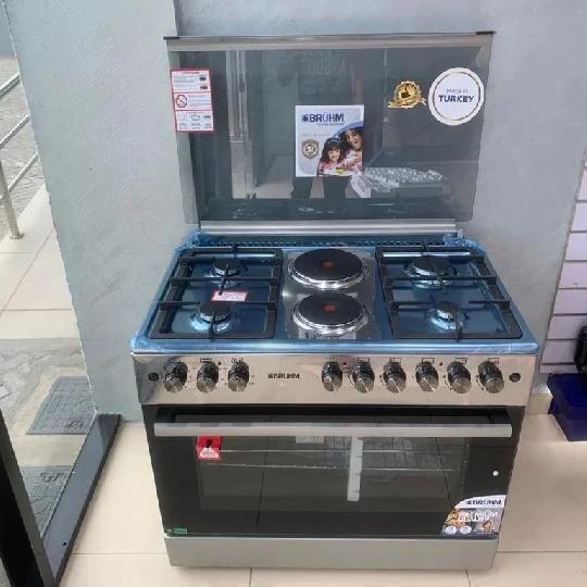 BRUHM GAS cooker 
2years warranty 
4gas cooker 
2electric plate 
Oven electric 
Silver 
Temper 
Still frame 
Auto ignition 
Bei?